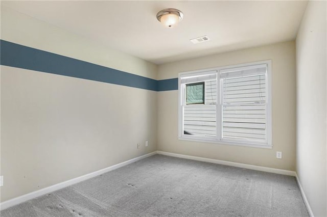 1604 Gilstrap Ln NW, Atlanta, GA 30318 - carpeted spare room with baseboards
