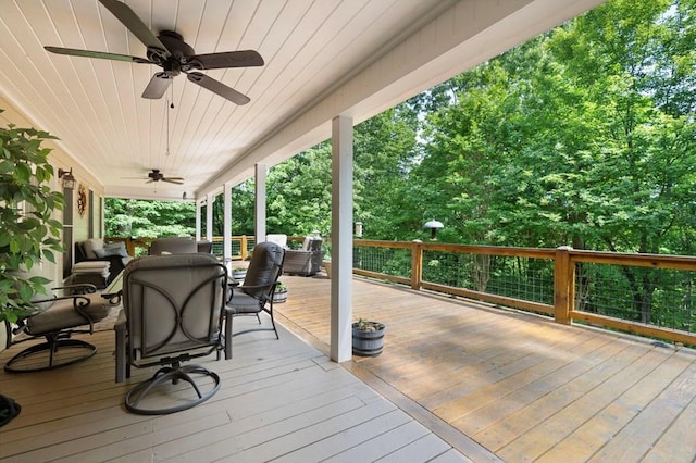 wooden deck with ceiling fan