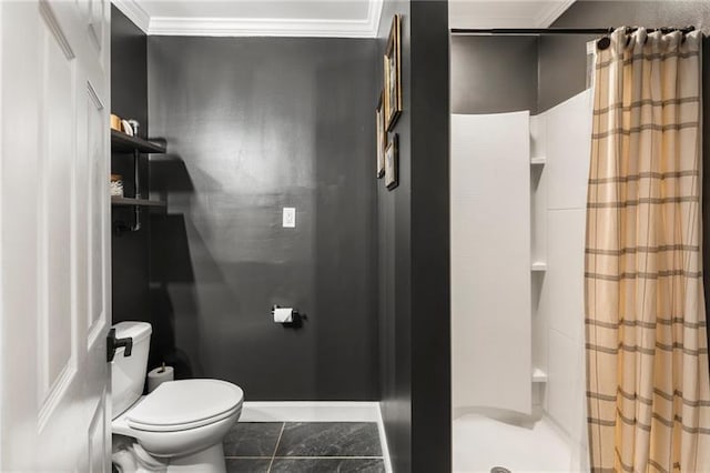 full bathroom with a stall shower, toilet, baseboards, and ornamental molding