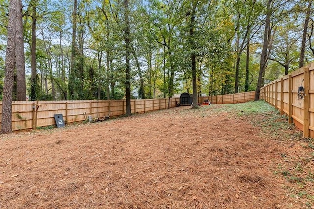 view of yard featuring a fenced backyard