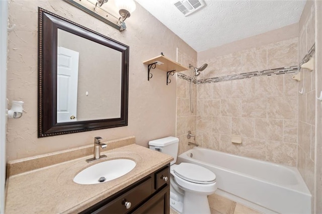 full bath featuring bathtub / shower combination, a textured ceiling, vanity, visible vents, and toilet