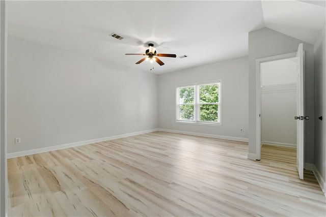 4011 Charrwood Trce, Marietta, GA 30062 - empty room with a ceiling fan, light wood-style flooring, baseboards, and lofted ceiling