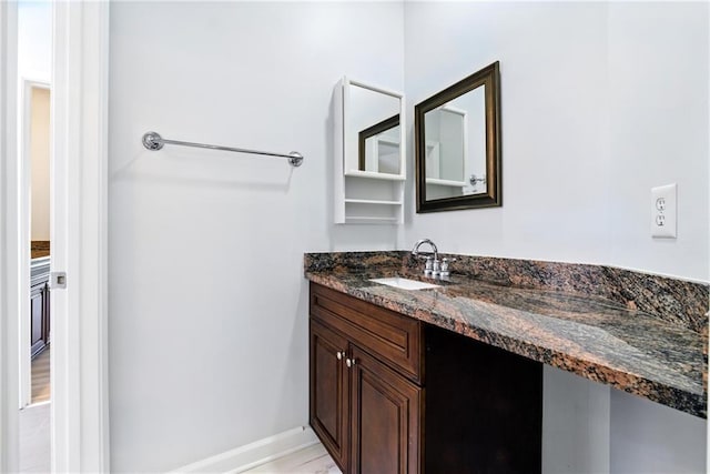 4011 Charrwood Trce, Marietta, GA 30062 - bathroom featuring vanity and baseboards