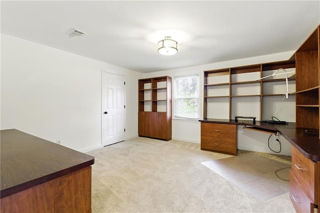 4011 Charrwood Trce, Marietta, GA 30062 - unfurnished office with light carpet, built in desk, and baseboards