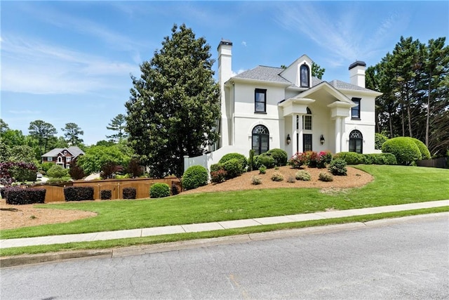 4011 Charrwood Trce, Marietta, GA 30062 - view of front of home featuring a chimney and a front lawn
