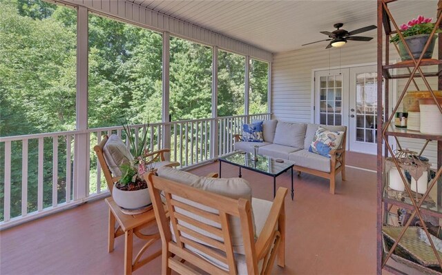 view of patio / terrace with ceiling fan and an outdoor living space