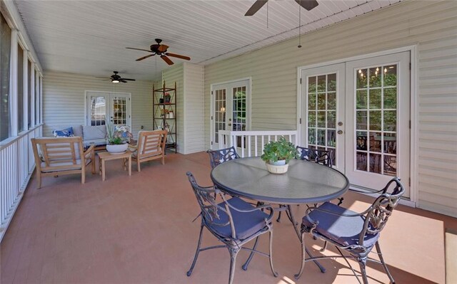 sunroom with ceiling fan and french doors