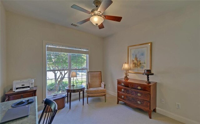 office area featuring ceiling fan and carpet flooring