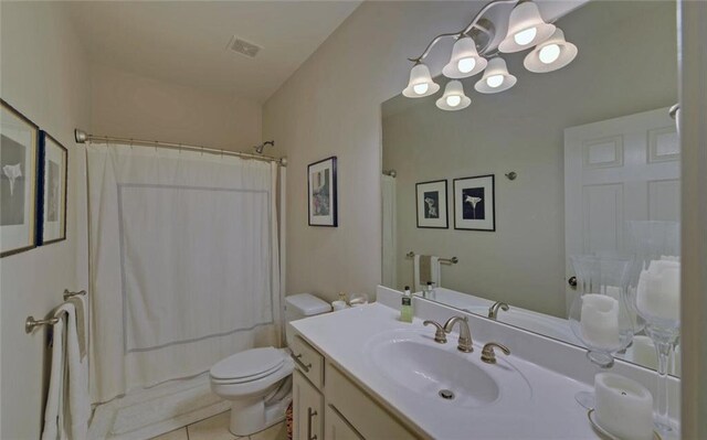 full bathroom with shower / bathtub combination with curtain, tile patterned floors, vanity, and toilet