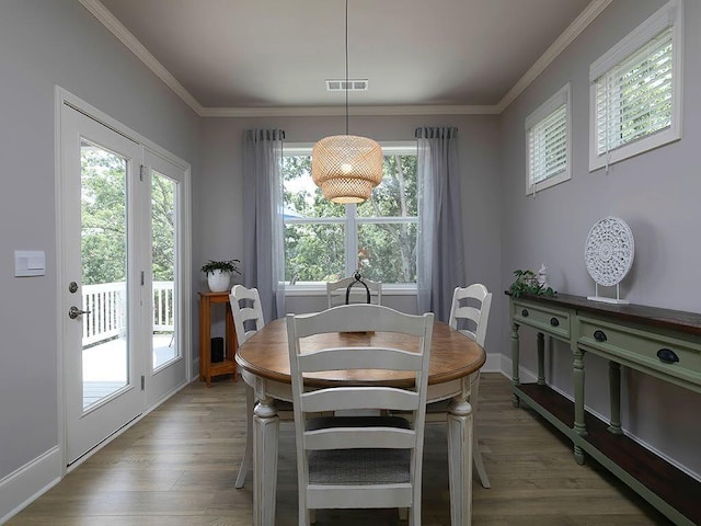 712 Broken Arrow, Waleska, GA 30183 - dining space with light wood finished floors and ornamental molding
