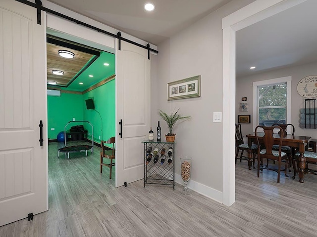 712 Broken Arrow, Waleska, GA 30183 - hallway with a barn door, light wood-style floors, and recessed lighting