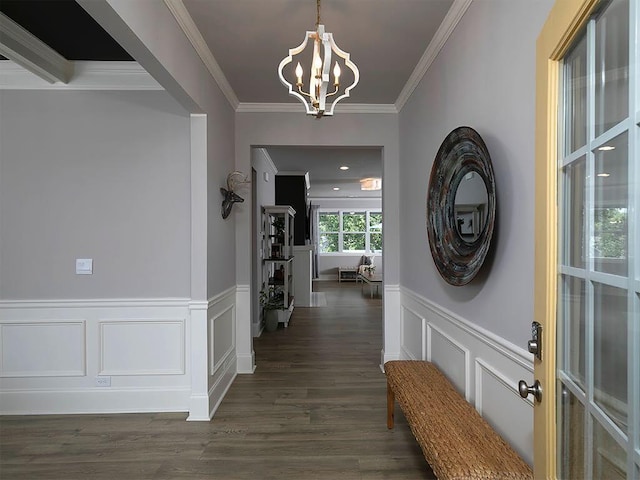 712 Broken Arrow, Waleska, GA 30183 - entryway featuring ornamental molding, a chandelier, a decorative wall, wainscoting, and dark wood-type flooring