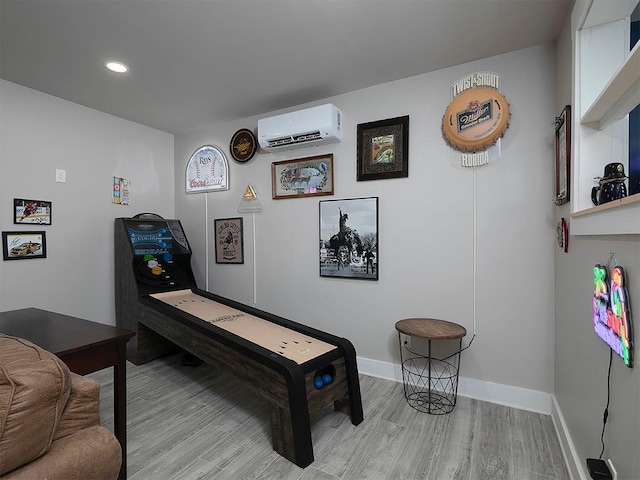 712 Broken Arrow, Waleska, GA 30183 - game room with a wall unit AC, light wood-style floors, and recessed lighting