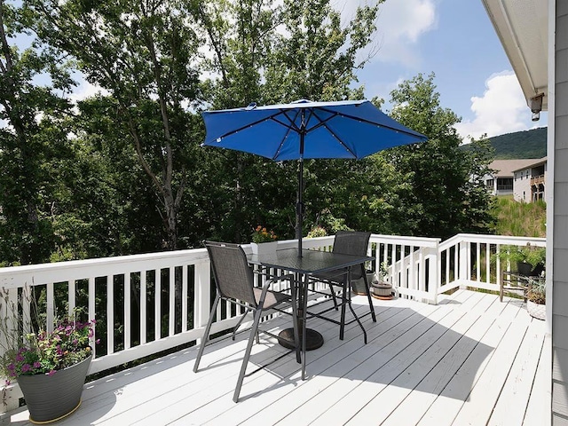 712 Broken Arrow, Waleska, GA 30183 - wooden terrace featuring outdoor dining space
