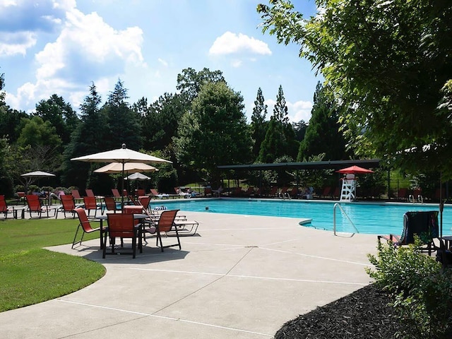 712 Broken Arrow, Waleska, GA 30183 - community pool with a lawn and a patio