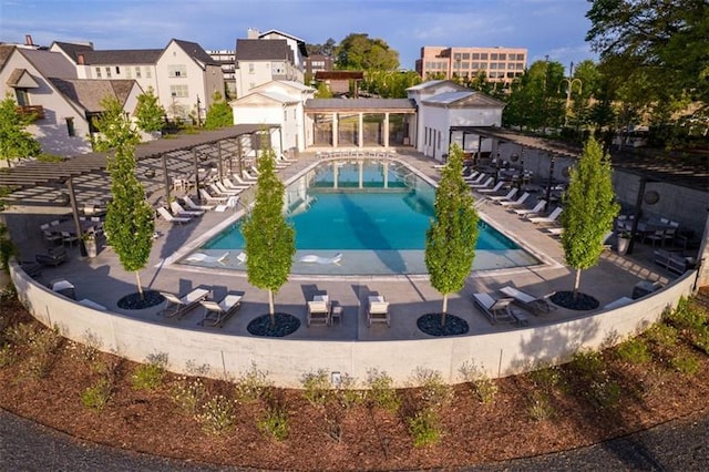 community pool with a patio