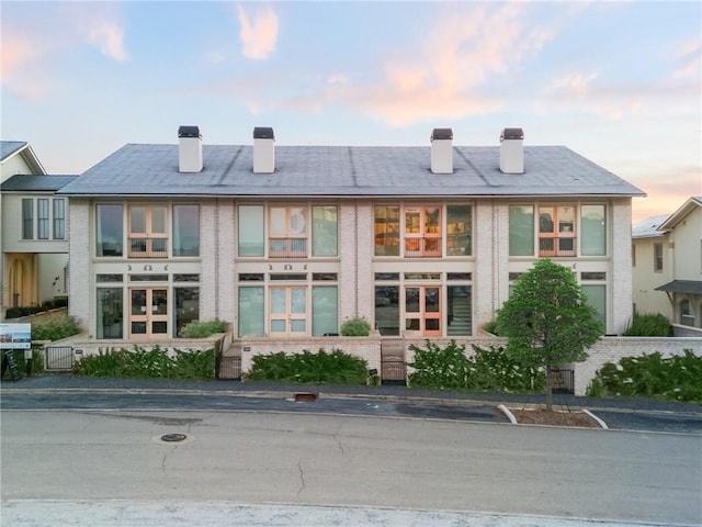 view of property at dusk