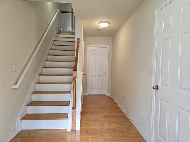 2104 Meadow Peak Rd, Duluth, GA 30097 - stairway featuring wood finished floors and baseboards
