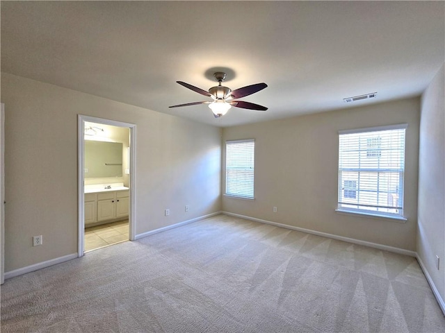 2104 Meadow Peak Rd, Duluth, GA 30097 - unfurnished room with light colored carpet, ceiling fan, and baseboards