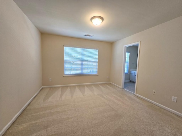 2104 Meadow Peak Rd, Duluth, GA 30097 - spare room with baseboards and light carpet