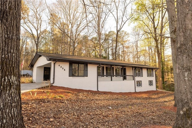 4336 Parkview Dr, Lithia Springs, GA 30122 - ranch-style house featuring brick siding, concrete driveway, and a carport