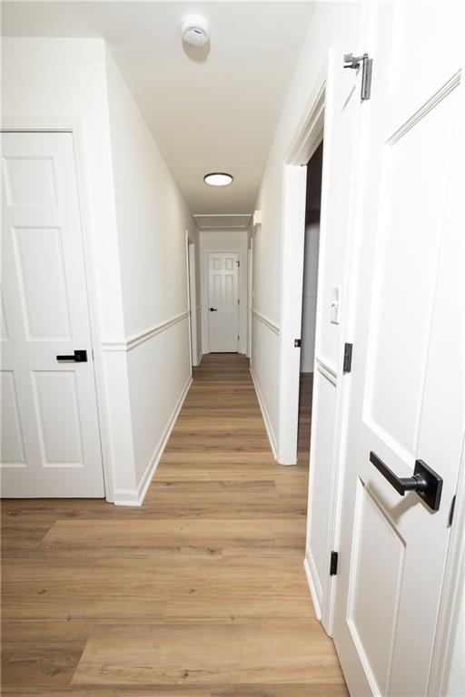 4336 Parkview Dr, Lithia Springs, GA 30122 - corridor featuring baseboards and light wood-type flooring