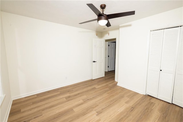4336 Parkview Dr, Lithia Springs, GA 30122 - unfurnished bedroom featuring baseboards, a closet, light wood-style flooring, and a ceiling fan