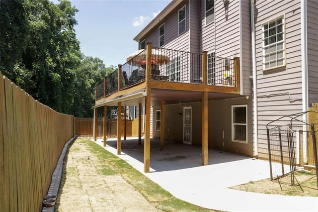 back of property featuring a patio