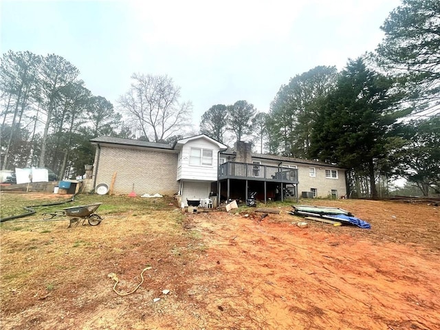 rear view of house with a deck