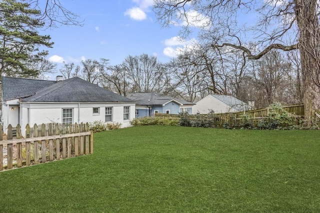 view of yard with fence