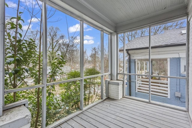 unfurnished sunroom with a healthy amount of sunlight