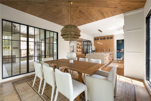555 Orme Cir NE, Atlanta, GA 30306 - dining area featuring wood ceiling, light wood-style floors, and vaulted ceiling
