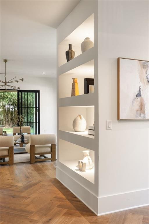 555 Orme Cir NE, Atlanta, GA 30306 - hallway featuring a chandelier and recessed lighting
