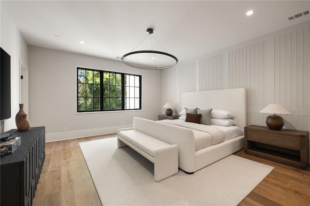 555 Orme Cir NE, Atlanta, GA 30306 - bedroom with baseboards, recessed lighting, and light wood finished floors