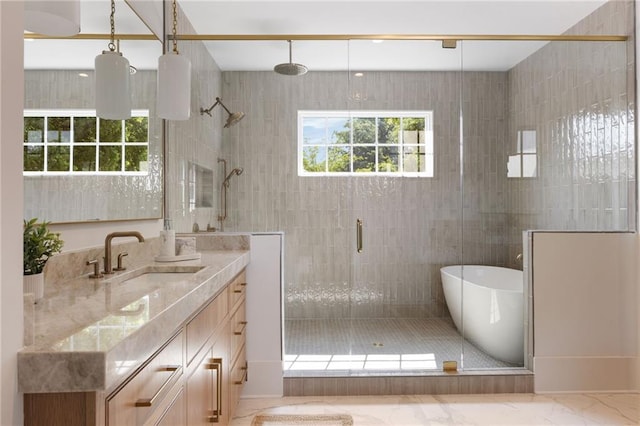 555 Orme Cir NE, Atlanta, GA 30306 - full bathroom featuring a shower stall, vanity, a freestanding bath, and marble finish floors