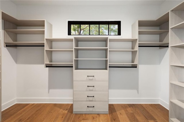 555 Orme Cir NE, Atlanta, GA 30306 - walk in closet featuring wood finished floors