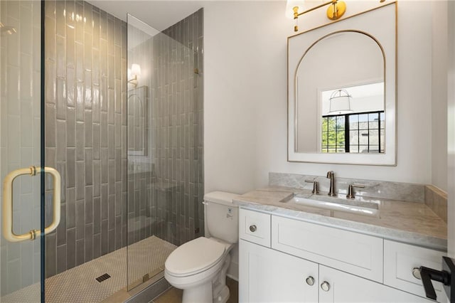 555 Orme Cir NE, Atlanta, GA 30306 - bathroom with toilet, vanity, and a shower stall