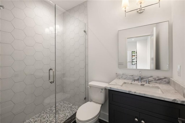 555 Orme Cir NE, Atlanta, GA 30306 - bathroom featuring toilet, vanity, and a shower stall