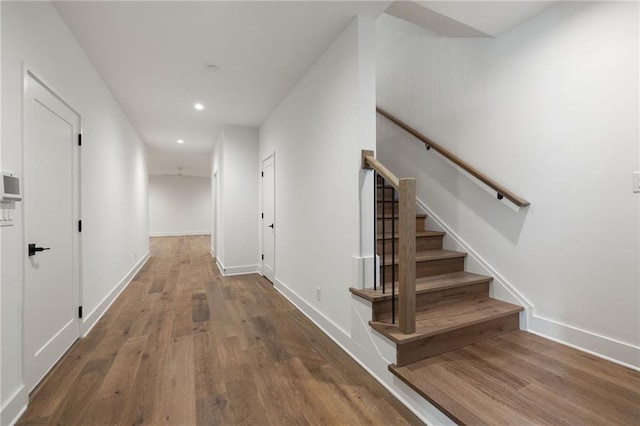 555 Orme Cir NE, Atlanta, GA 30306 - hall featuring wood finished floors, recessed lighting, stairway, and baseboards