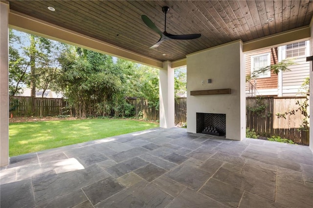555 Orme Cir NE, Atlanta, GA 30306 - view of patio with an outdoor fireplace and a ceiling fan
