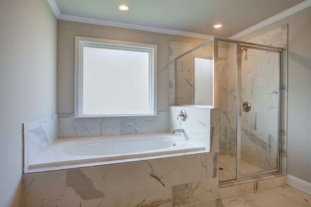 bathroom featuring a garden tub, a stall shower, and crown molding