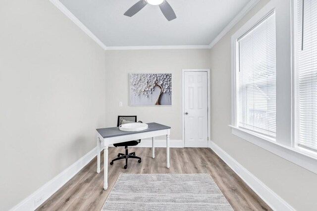11 Poplar St, Porterdale, GA 30014 - home office featuring crown molding, wood finished floors, a ceiling fan, and baseboards