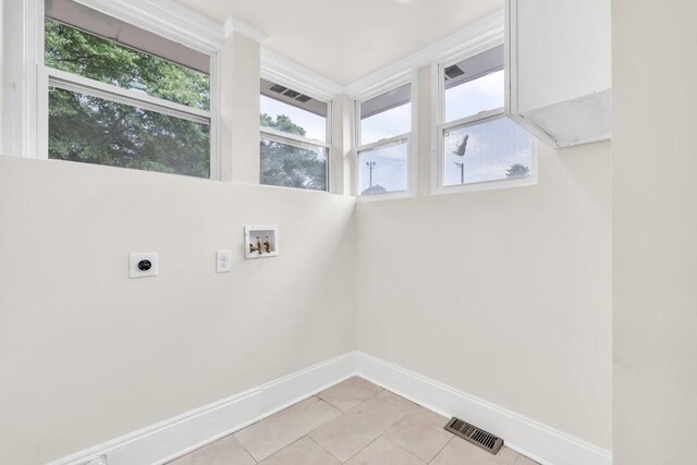 11 Poplar St, Porterdale, GA 30014 - washroom featuring hookup for an electric dryer, baseboards, hookup for a washing machine, and light tile patterned floors