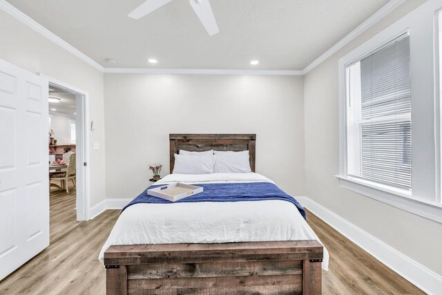 11 Poplar St, Porterdale, GA 30014 - bedroom featuring crown molding, light wood finished floors, recessed lighting, baseboards, and a ceiling fan