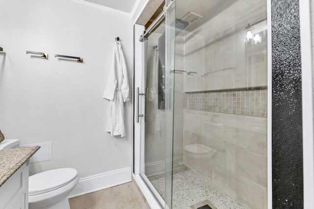 11 Poplar St, Porterdale, GA 30014 - full bath with toilet, vanity, a shower stall, crown molding, and baseboards