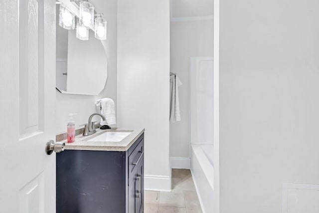 11 Poplar St, Porterdale, GA 30014 - full bathroom featuring vanity, a chandelier, tile patterned flooring, and baseboards