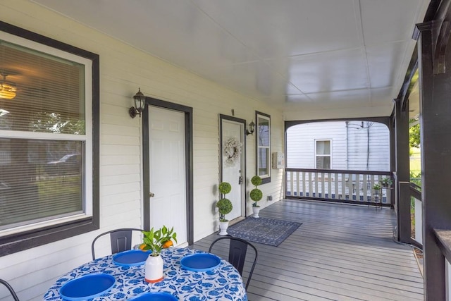 11 Poplar St, Porterdale, GA 30014 - deck featuring covered porch and outdoor dining space