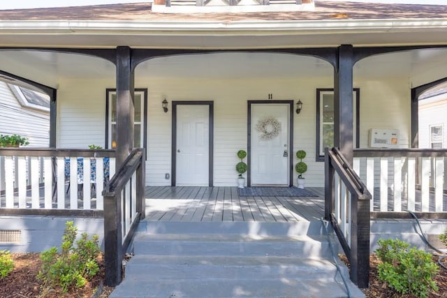 11 Poplar St, Porterdale, GA 30014 - view of exterior entry featuring a porch