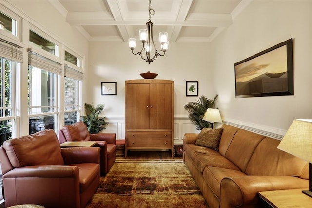 225 Mystic Ridge Hl, Sandy Springs, GA 30342 - living area with coffered ceiling, a chandelier, wood finished floors, beamed ceiling, and a wainscoted wall