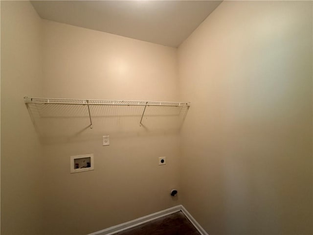 381 Plymstock Dr, Mcdonough, GA 30253 - laundry room featuring hookup for an electric dryer, hookup for a washing machine, and baseboards